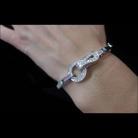 Cartier Jewelry - 18K White Gold Cartier Agrafe bracelet 85K.
7.00“